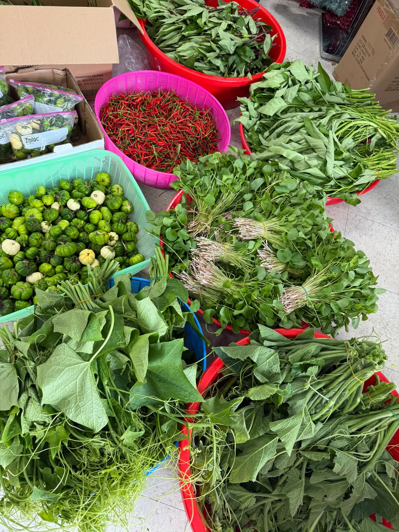 Inside Myanmar Asian Market — shelves of Burmese groceries, glass jars and rice sacks
